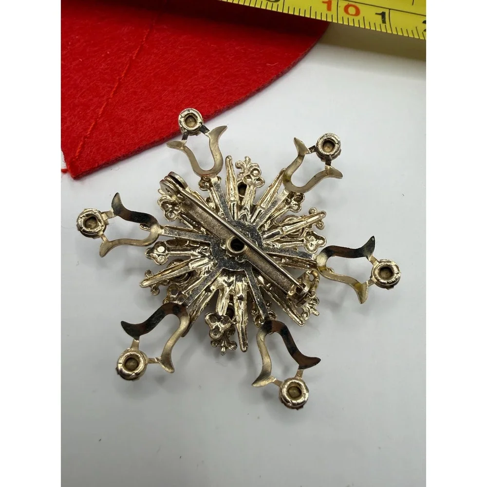 Gold-toned‎ rhinestone starburst brooch floral enamel design blue rhinestones.
